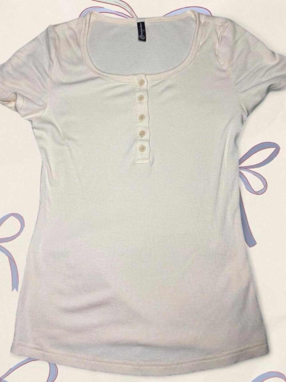 Cream basic tee with buttons, slightly see-through but not too bad  - Size S.